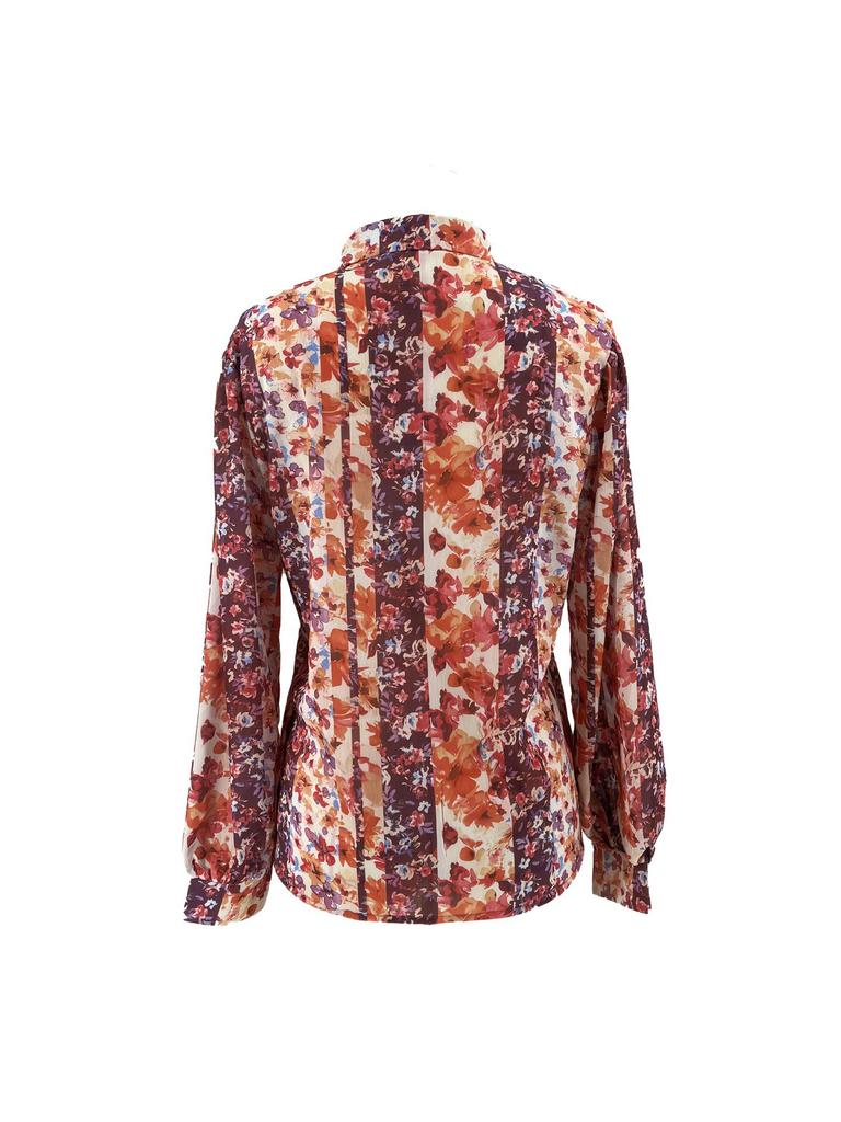 Lebhafte pinke und orangefarbene florale Chiffonbluse mit langen Ärmeln