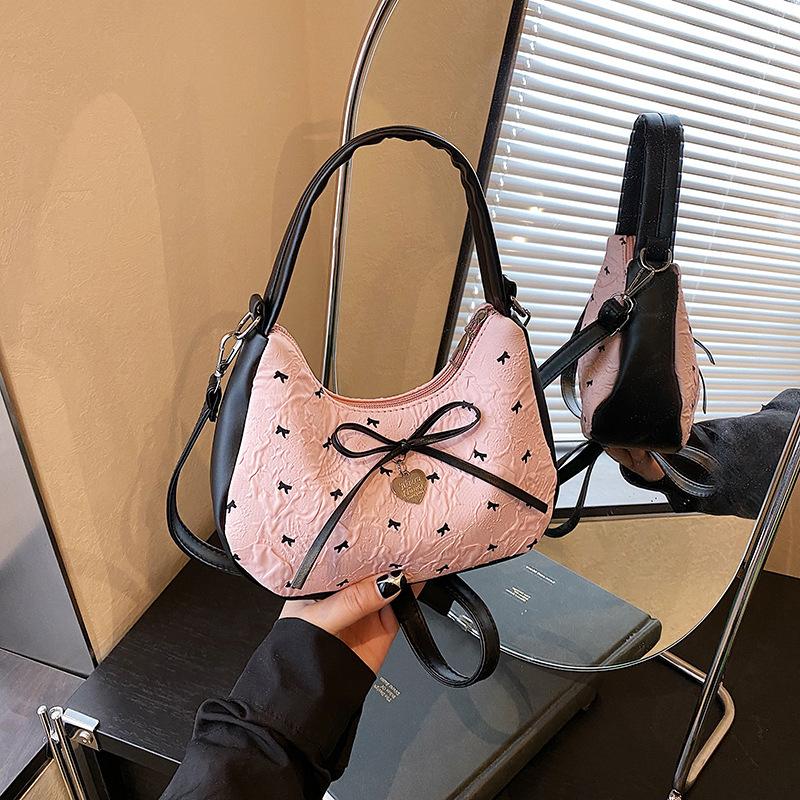 Нишевая сумка под мышкой женская 2025 новая летняя сумка-багет с бантом модная наплечная сумка для通勤