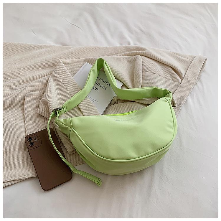 Casual versatile dumpling bag new fashion simple candy color shoulder bag large capacity student class messenger bag woman