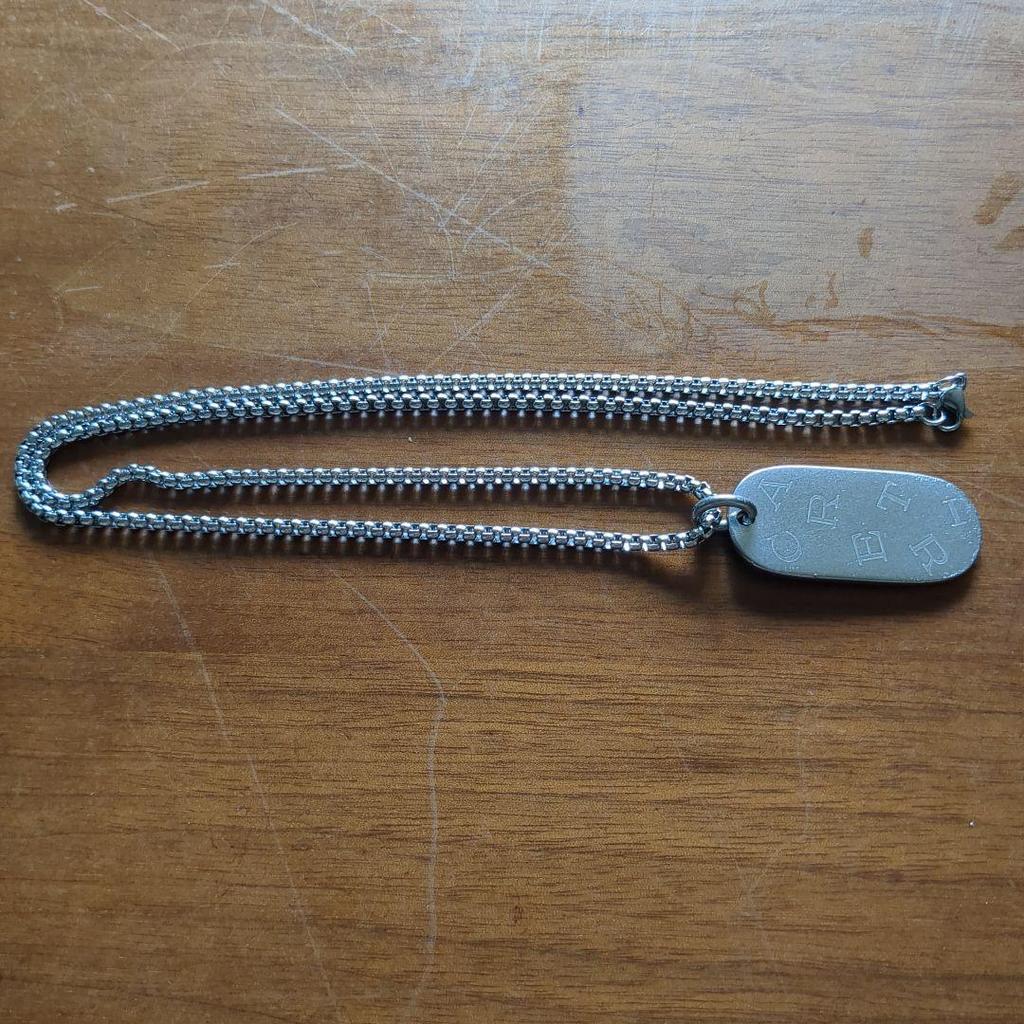 Used Cartier dog tag necklace