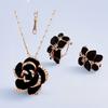 Vergoldetes Schmuckset: Schwarzes florales Design mit Strasssteinen, mit Halskette und Ohrringen für Damen
