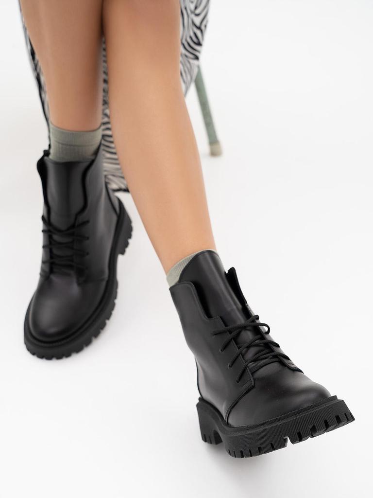 Black Leather Boots On ISSA Plus Bike