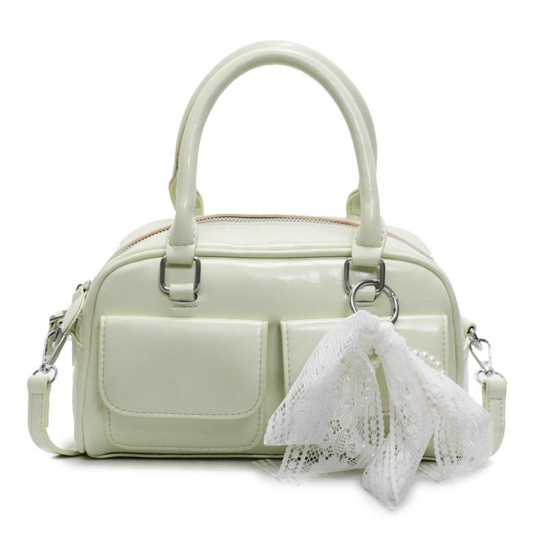 Korean version of the popular spring and summer dopamine simple portable Boston bag niche casual foreign style commuter messenger bag bag woman