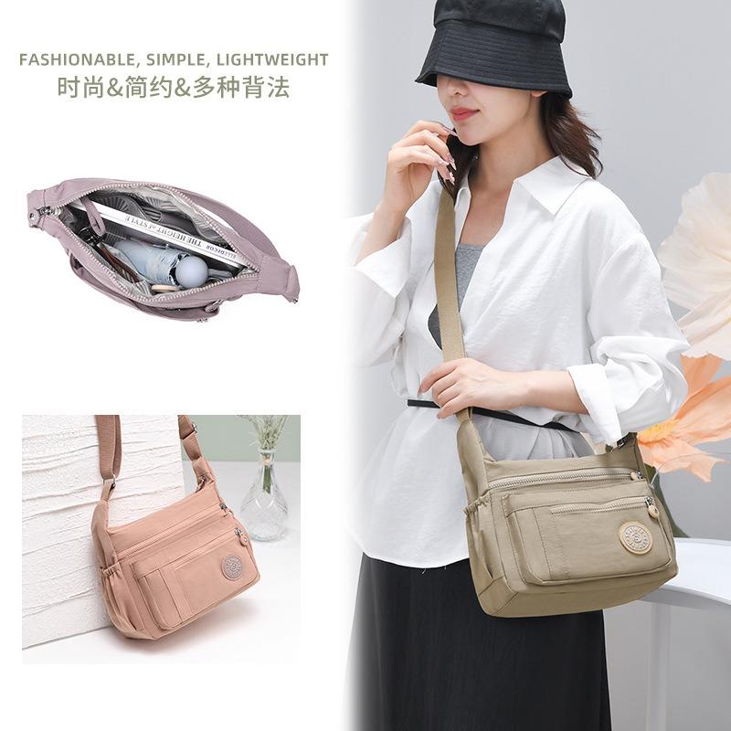 Neue Umhängetasche mit großem Fassungsvermögen, leichte Stofftasche, Muttertasche, mehrschichtige Schultertasche, Damen-Reiserucksack
