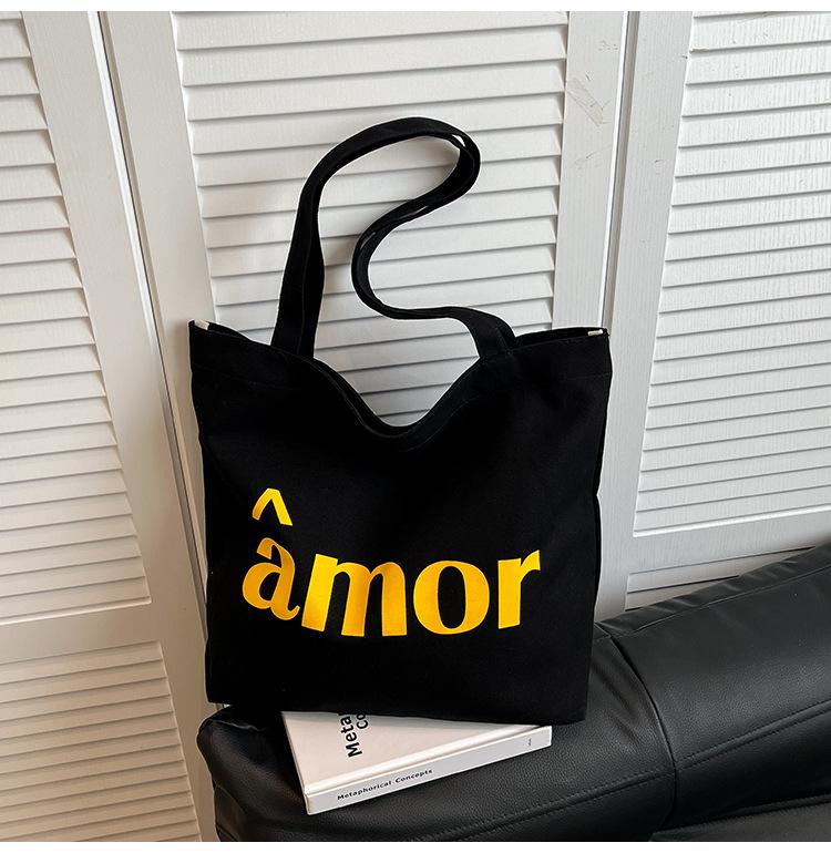 

2025 new shoulder bag niche design versatile letter college student class canvas bag fashion underarm tote bag чёрный