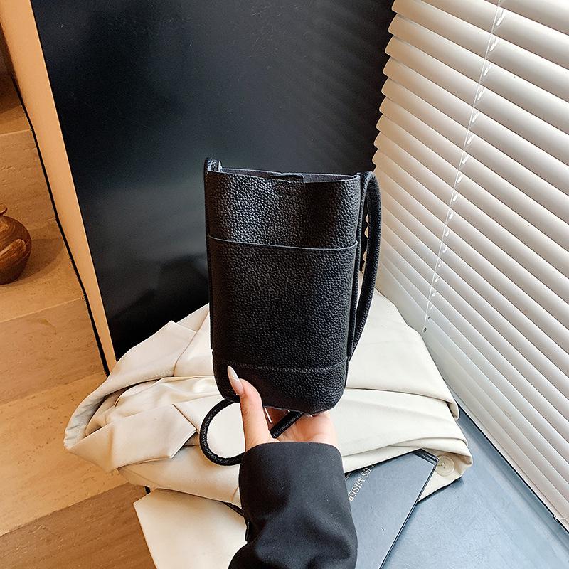 

Splicing portable bucket bag women s bag summer new simple shoulder bag commuter messenger bag чёрный