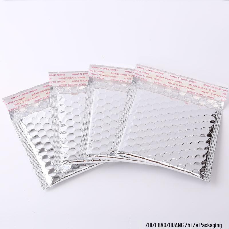 

Colored Aluminum Bubble Mailer with Small Bubbles - Self-Adhesive, Waterproof, Shockproof, Thickened for Clothing Packaging Aluminum Silver 150g; 13*18+4CM, 900 pieces/150g