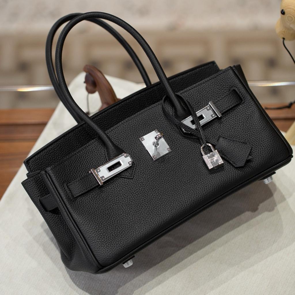 Neue lange Tragetasche Verschluss Silberschnalle Oberleder Rindsleder Mode Ein-Schulter-Handtasche Schloss Schnalle Leder Damen Tasche Handtasche