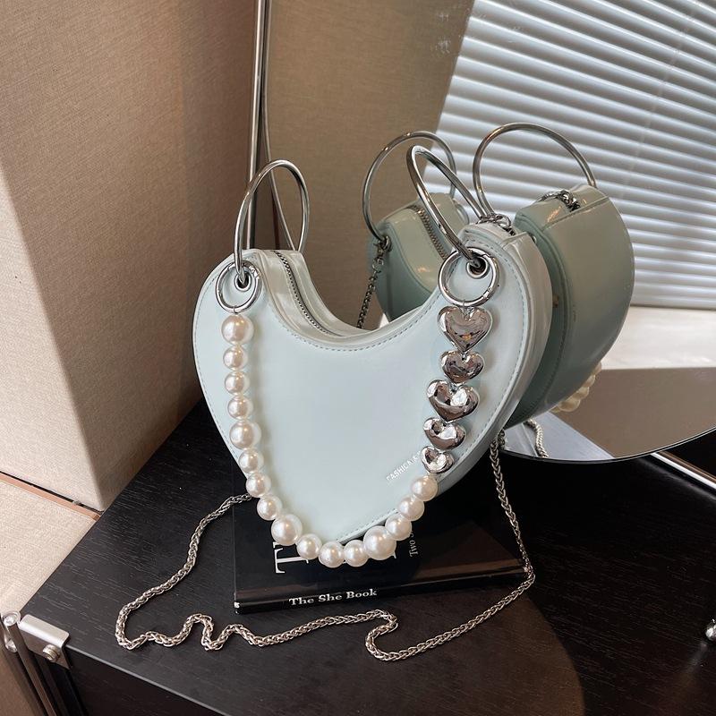 

Niche bag women s new summer chain messenger bag peach heart bag светло-синий