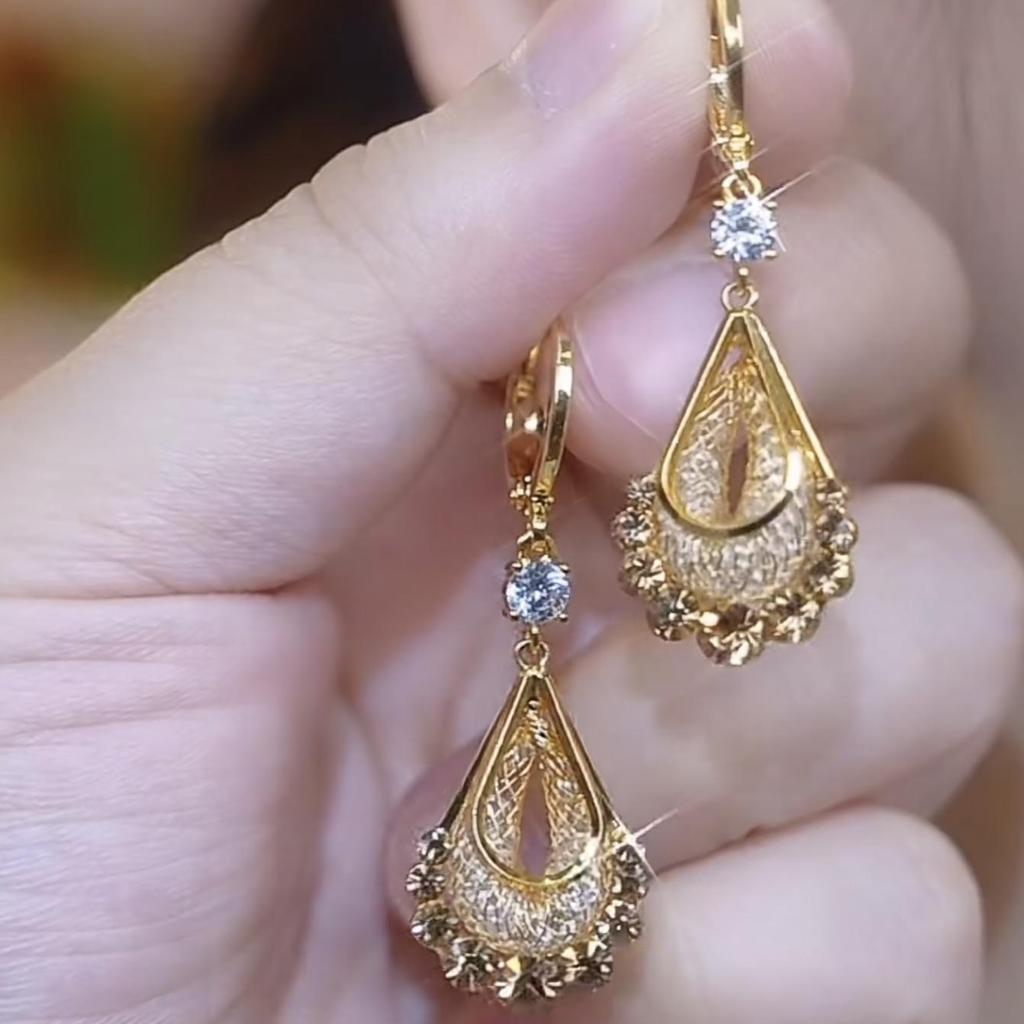 Elevate Your Style with These 2025 Hot Purple Mesh Water Drop Earrings, Featuring a High-end Luxury Niche Design and Exquisite Ear Buckles for Women.