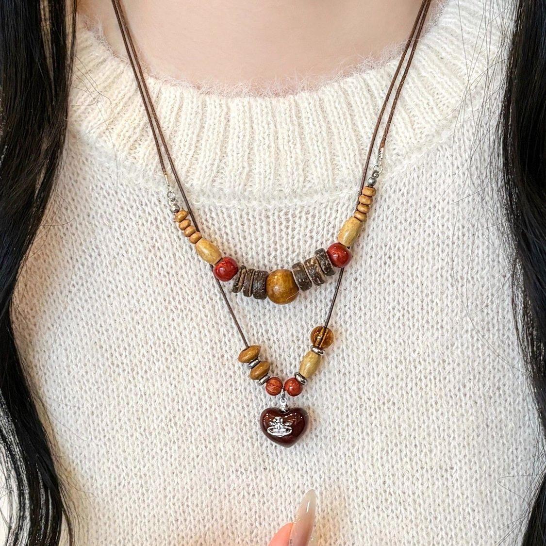 

Геометрическое ожерелье с подвеской из больших и маленьких квадратов One Size