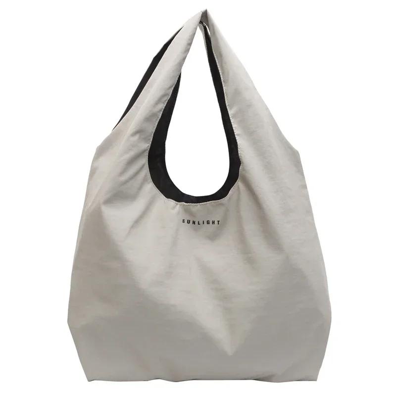 

Leisure Commuting Soft Solid Canvas Bags 2026 High-quality Multi Functial Handbag Large Capacity Letter Printed Shoulder Bags білий