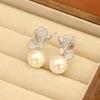 New temperament: stone-inlaid butterfly earrings, gold-plated, versatile pearl-free ear clips, women's earrings, high-end accessories