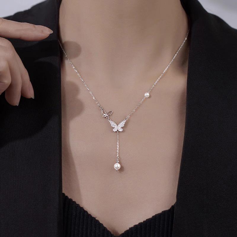 Elegant Pearl & Butterfly Tassel Necklace - 2024 Trendy High-End Luxury Women's Accessory
