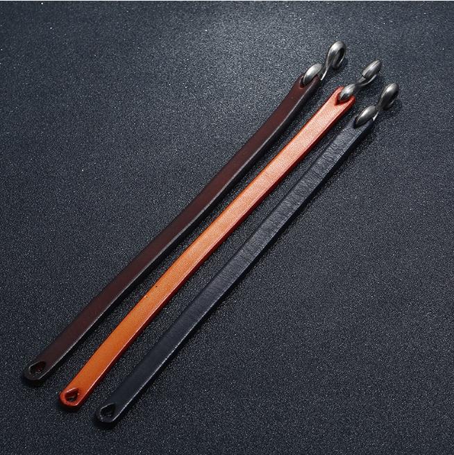 Braided leather bracelet with a black cross, 21cm
