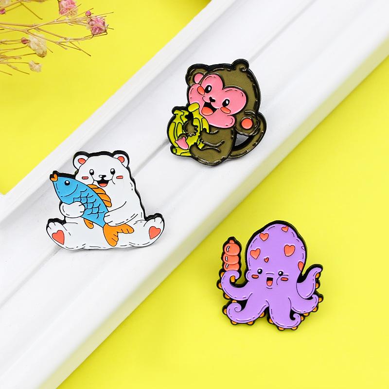 Animal-Themed Brooch: Monkeys with Bananas, Cats with Fish, Octopuses with Candied Hawthorns