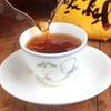 357g Yiwu Puerh Reifer Teekuchen Yunnan Pu'er Gekochter Tee Bio Pu-erh Schwarzer Tee
