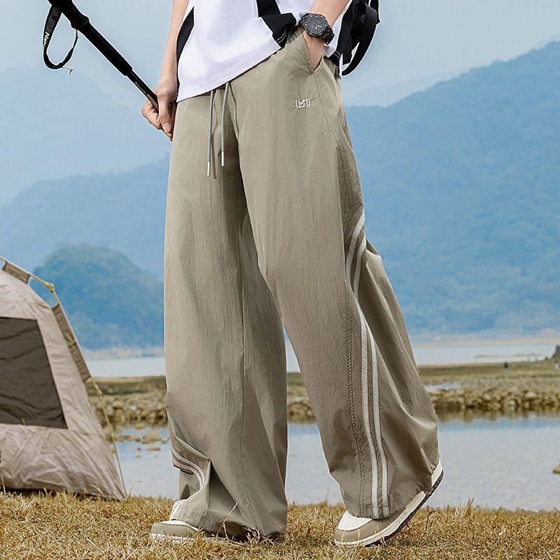 Spring and summer new European scimitar striped loose khaki wide-leg casual pants men's very light pants