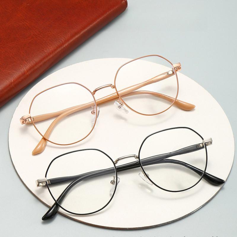 

2 Pair of Women S Round Frame Glasses in Various Colors Featuring a Vintage Minimalist Style