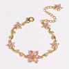 Fine Fashion Jewelry 18k Gold Plated Brass Bowknot Bracelet Exquisite Zircon Flower and Bow Charm Bracelet for Women