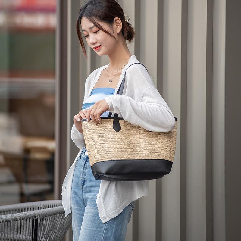 Casual and fashionable straw-woven contrasting color splicing tote women's bag, a new large-capacity light luxury women's bag.