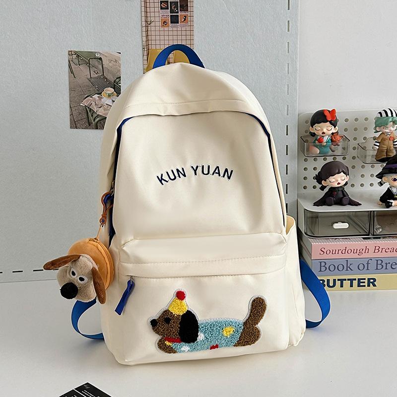 Schoolbag new cute puppy backpack large capacity primary school students junior high school students lightweight schoolbag simple fashion alphabet 