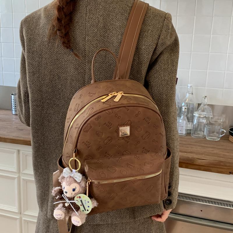 Retro Brown Large Capacity Handheld Backpack for Women's New High End, Niche and Non Collision Style Backpack