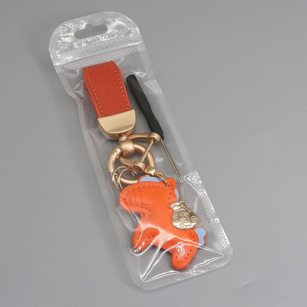 Kleiner Schaf- & Pferdeleder-Schlüsselanhänger mit Perlenanhänger - Gold