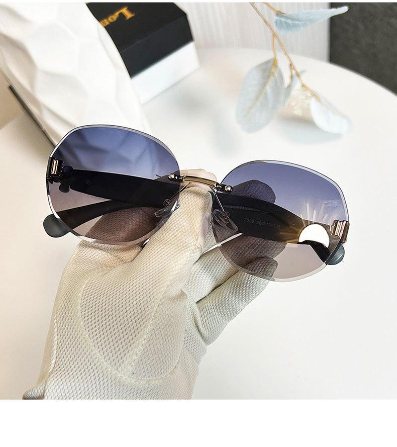 Women's Egg-Shaped Stylish Frameless Retro Sunglasses for Summer Photoshoots