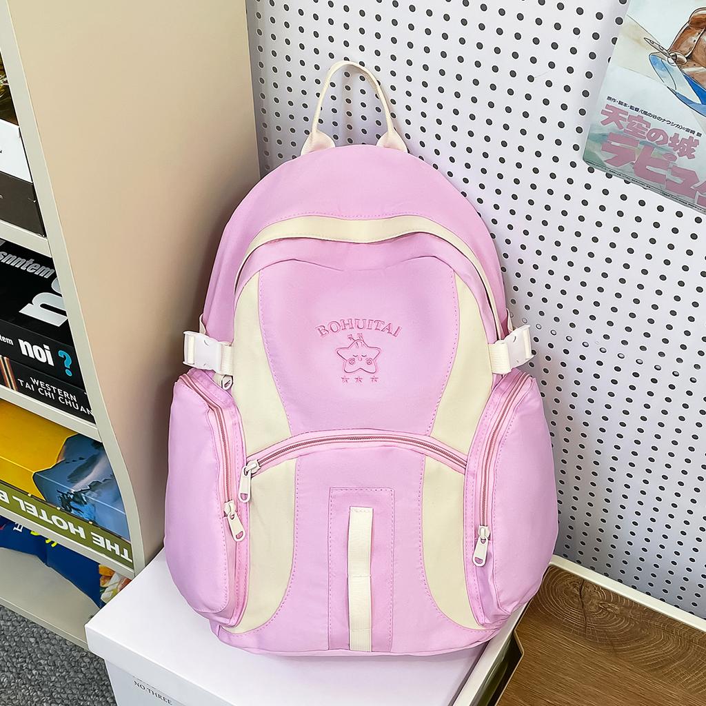 Korean version of large-capacity junior high school student schoolbag travel backpack high-value ins wind niche contrasting color backpack women