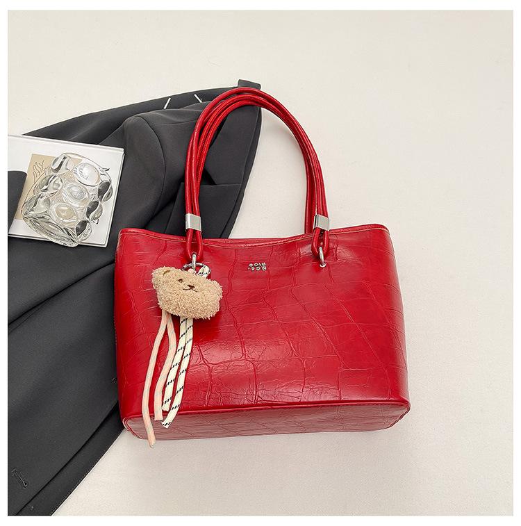 

Large capacity 2025 new fashionable and foreign commuter shoulder bag, popular texture stone pattern simple tote bag this year красный