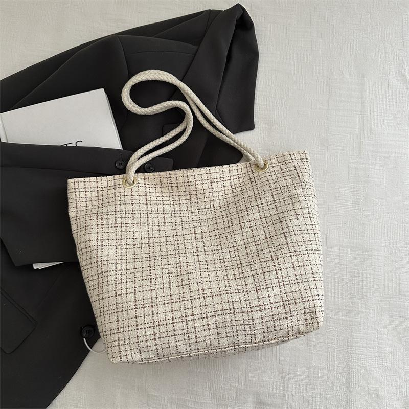 Plaid woven tote bag women's 2025 new high-value commuter art students class handheld cloth bag tide