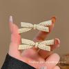Korean Fashion Bow Pearl Rhinestone Hair Clip - Elegant 2026 Design for Bangs and Side Styling.