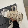 Today's popular woven hollow pillow bag trend rivet fashion casual portable messenger women's bag shoulder bag