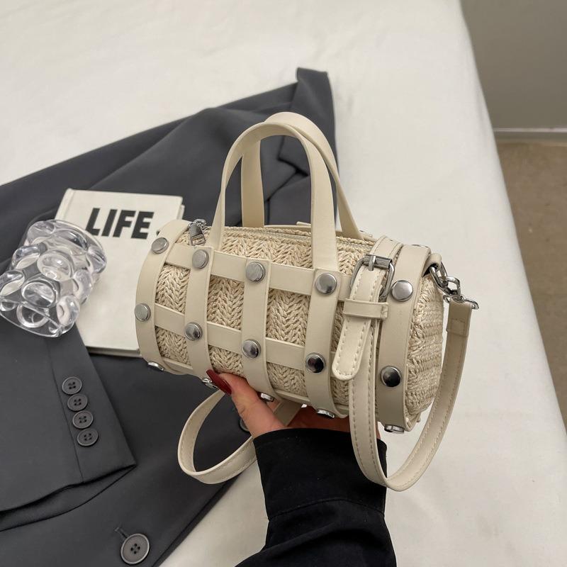 Today's popular woven hollow pillow bag trend rivet fashion casual portable messenger women's bag shoulder bag