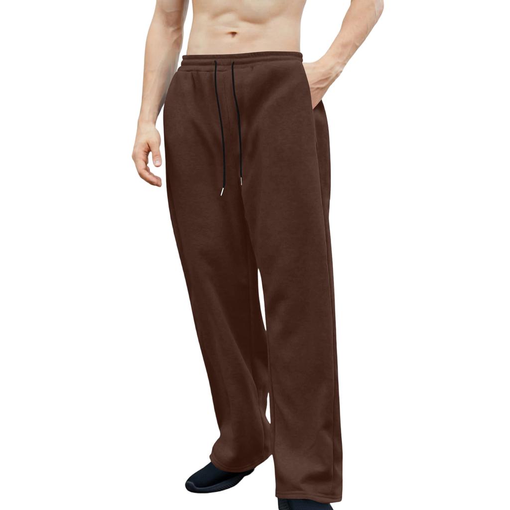 Pánské tepláky s elastickým pasem, rovný a široký střih, volný střih, s kapsami v pase.