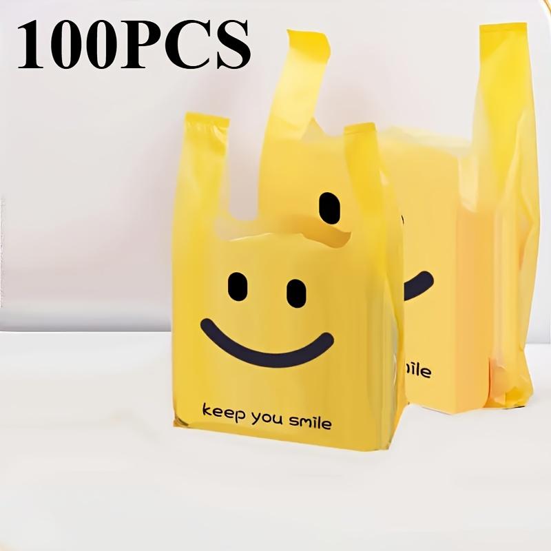 Gelbes Smiley Einkaufstaschen Robuste Plastik Tragetaschen mit minimalistischem Design Ideal für Firmen-, Event- und Mode-Einzelhandelsverpackung Geschenktüten