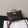 All-matching Retro Design Top-layer Cowhide 2026 Lock-up Fashionable Casual Commuting Portable One-shoulder Cross-body Bag