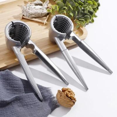1 pinza multifuncional de metal plateado para nueces, herramienta doméstica para descascarar nueces, castañas y avellanas.