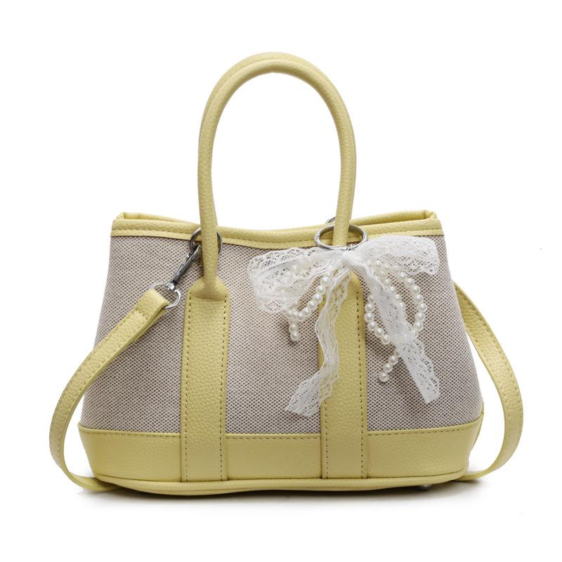 Wholesale Korean version of casual niche contrasting color portable bucket bag commuting versatile simple personality messenger women's bag