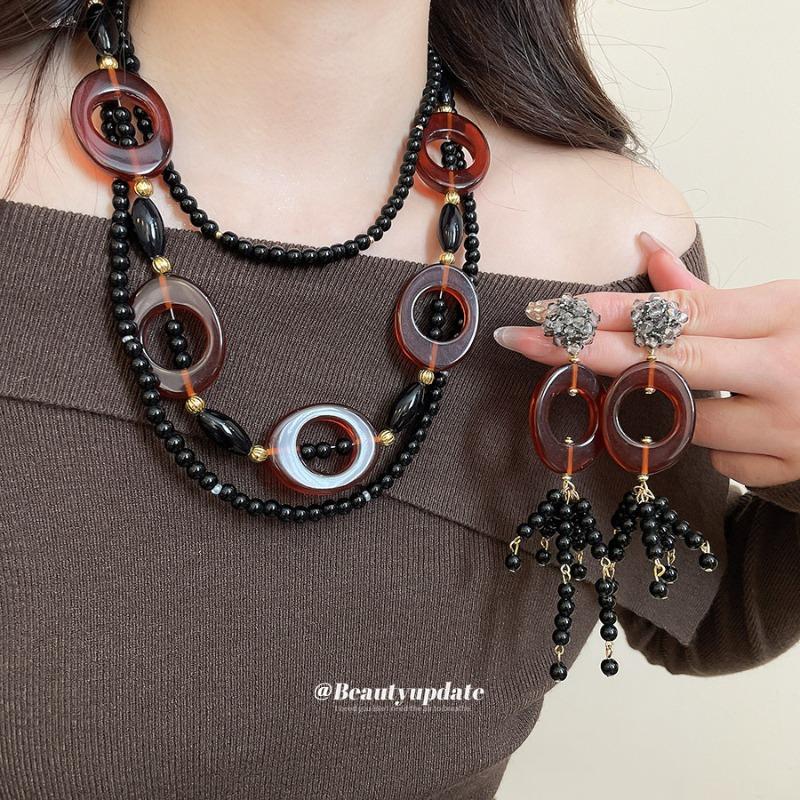 

Crystal oval tassel necklace and earrings - ethnic-inspired, unique jewelry set