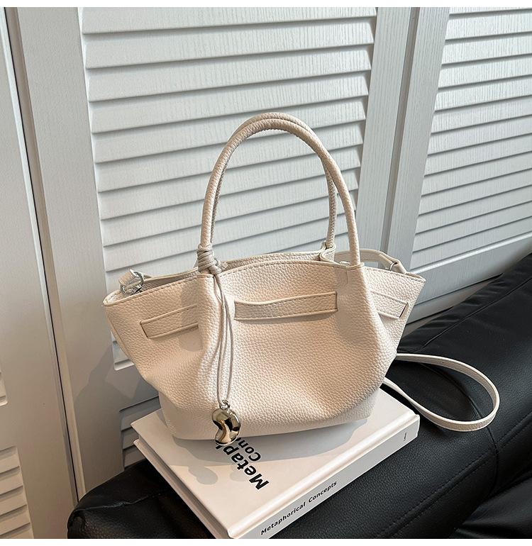 

Зарубежный заказ ретро портативная сумка-ведро женская 2025 весна новая легкая роскошь высокая текстура повседневная на плечо сумка-мессенджер белый