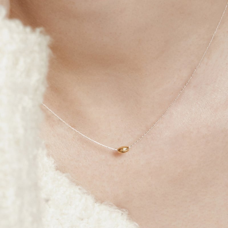 

Manaet Gold Oval Ball Pendant N Gold Combi