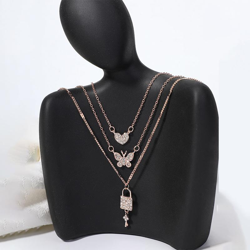 Butterfly love necklace European and American new personalized jewelry key pendant multi-layer women's street shot crystal sweater chain