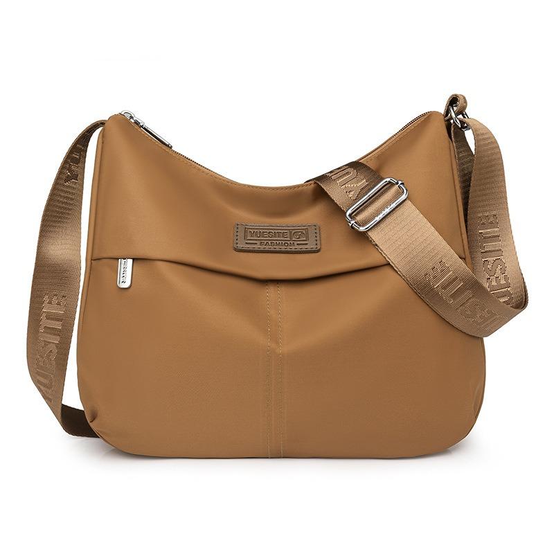 Einfacher und großzügiger Schulterrucksack Vielseitige, spritzwassergeschützte Nylontasche mit großem Fassungsvermögen Modetrend schräg getragener Damenrucksack