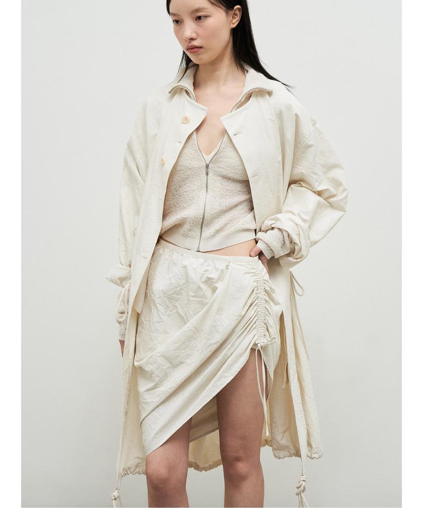 Anggae Wonderer Wrinkle String Mini Skirt Ivory