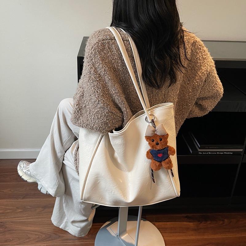 Bag women's new soft leather tote bag large capacity women's niche high-end sense of commuting to work portable shoulder bag