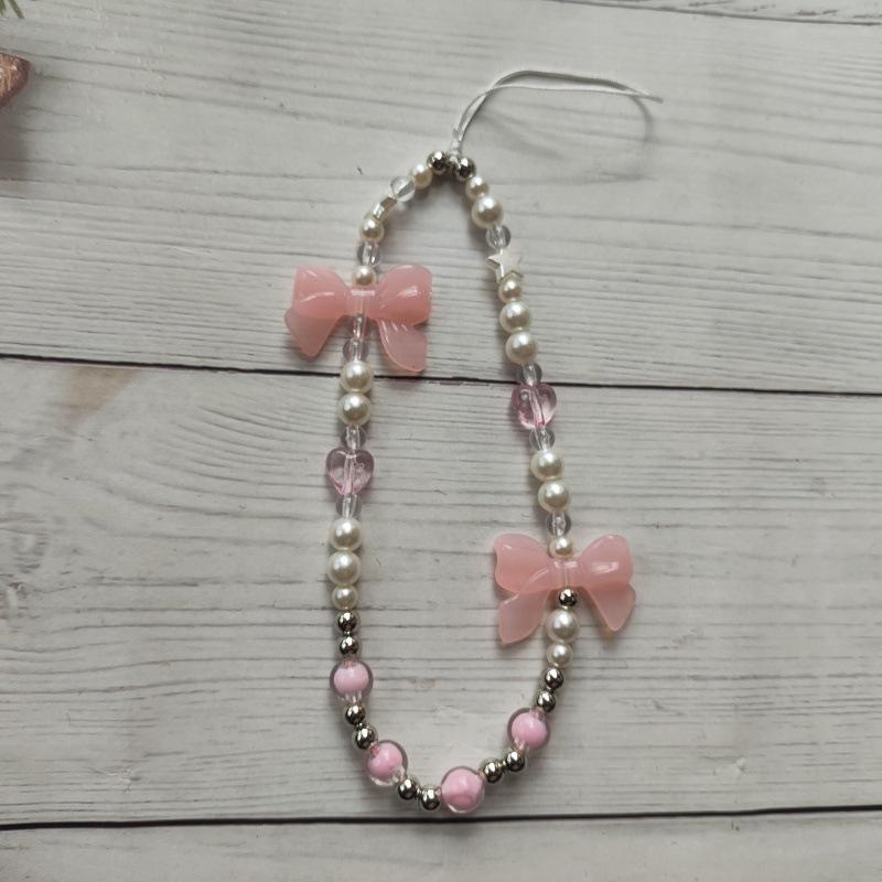 

Cute Fruit Bow Chain Wrist Strap: Anti-fall Keychain & Phone Case Accessory for Lazy Binge-watchers розовый