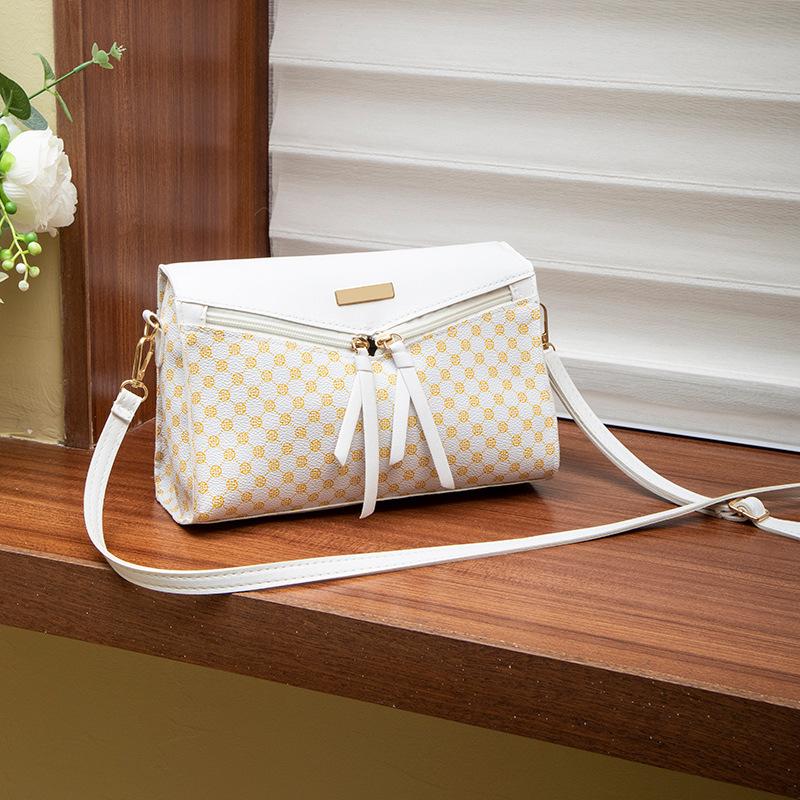 Women's bag, new women's change bag, niche bag, messenger bag, printed shoulder bag, one piece.