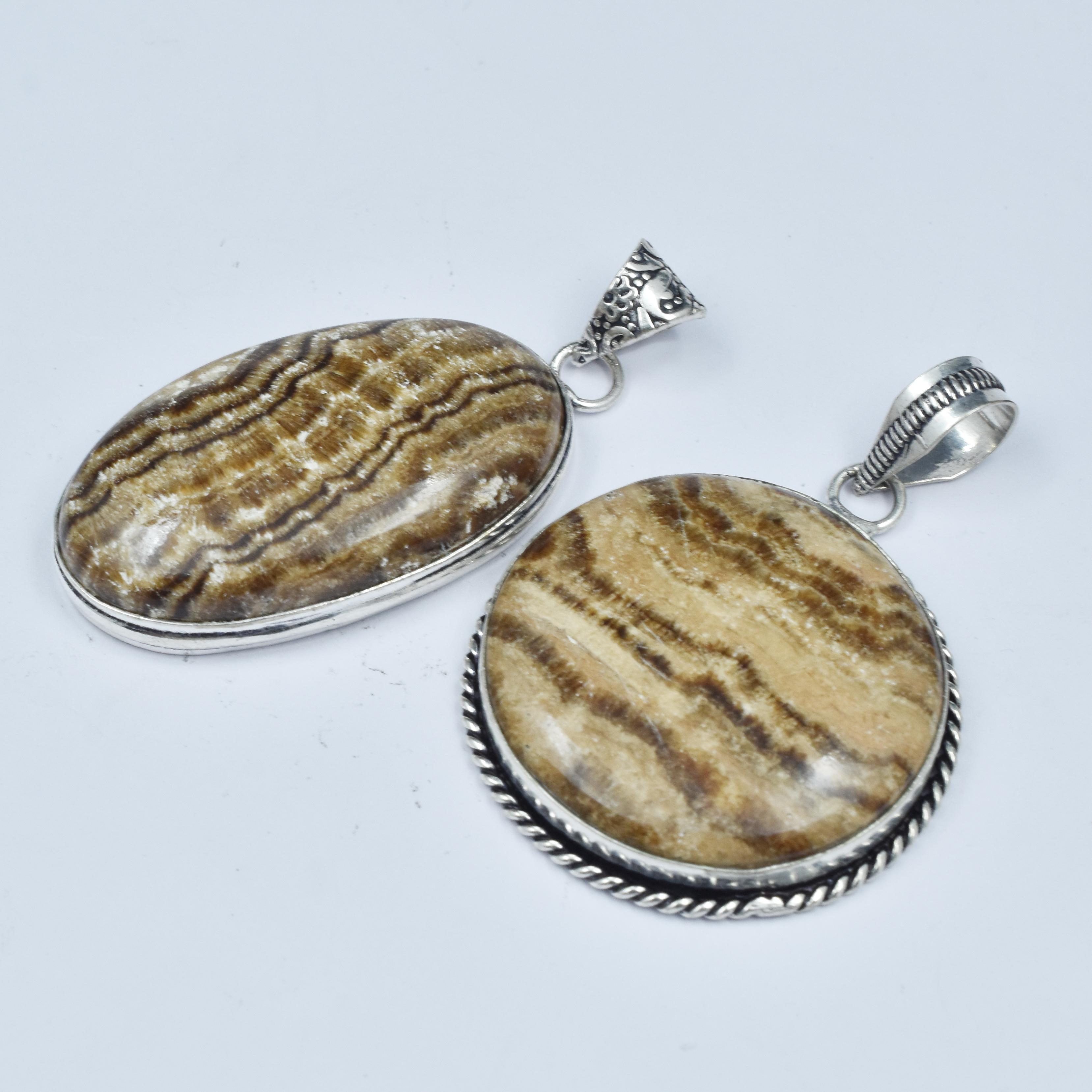 

Aragonite Oval-Round 136Ct Natural CERTIFIED Gems 925 Sterling Silver Pendant AR-1736 38-31 mm коричневий